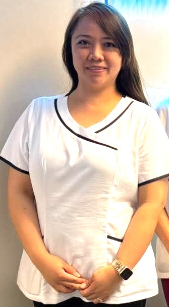 A professional portrait of Rose Atack.